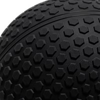 Detailopname van het oppervlak van de VirtuFit Slam Ball met focus op het duurzame rubber en de antislip textuur.